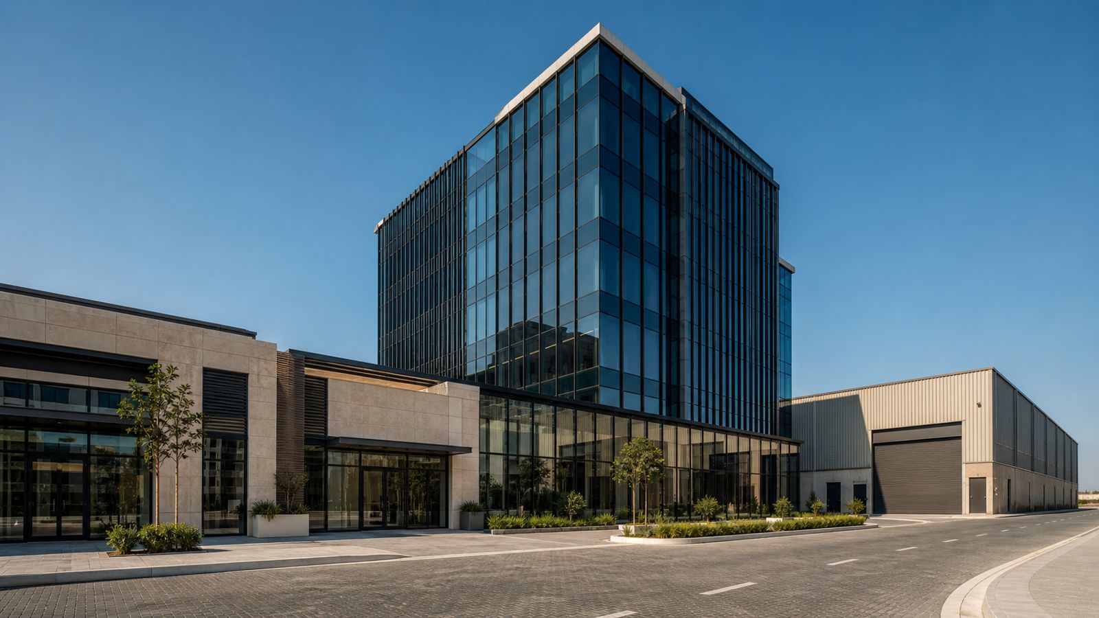 Modern Dubai commercial buildings: an office tower, retail units and a warehouse